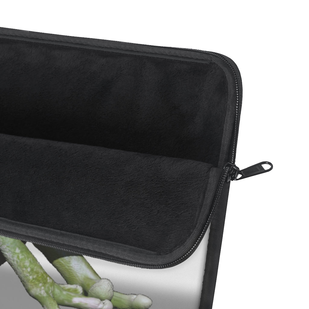 Frog Laptop Sleeve featuring a vibrant frog design on one side and a sleek black backside, perfect for protecting your laptop.