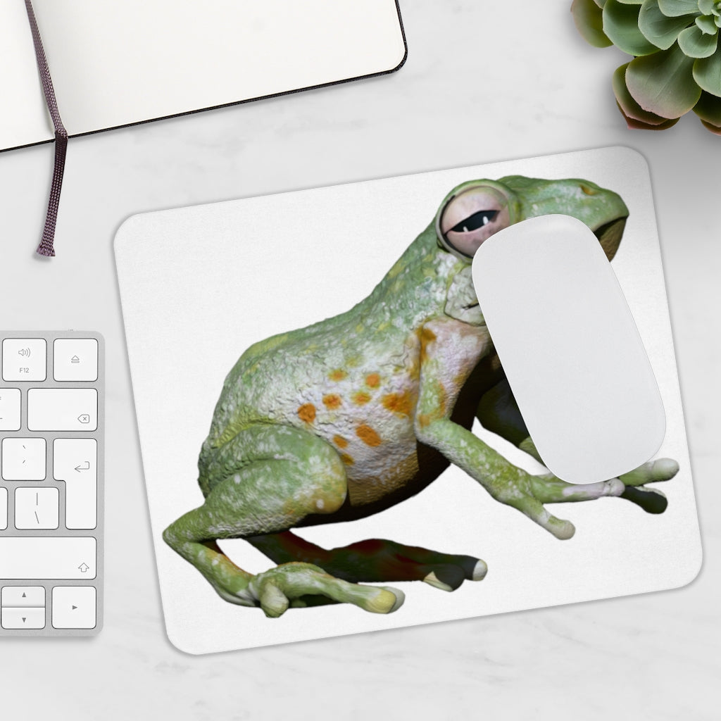 A colorful frog-themed mouse pad with a smooth surface and non-slip backing, perfect for enhancing desk decor.