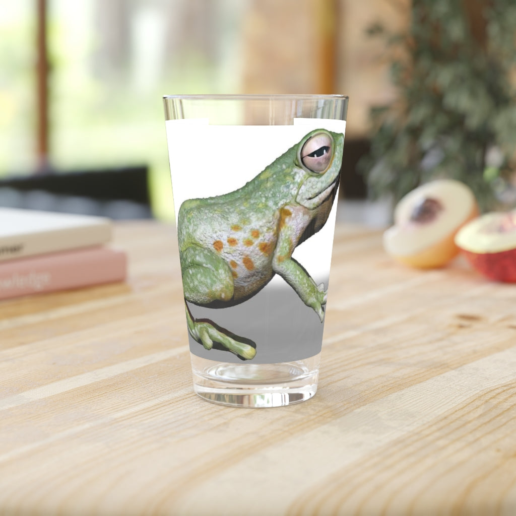 A clear 16oz Frog Pint Glass showcasing its elegant design, perfect for personalization and versatile use.