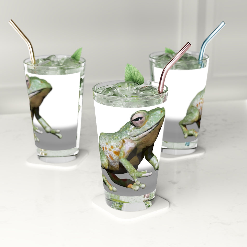 A clear 16oz Frog Pint Glass showcasing a customizable design, perfect for beverages.