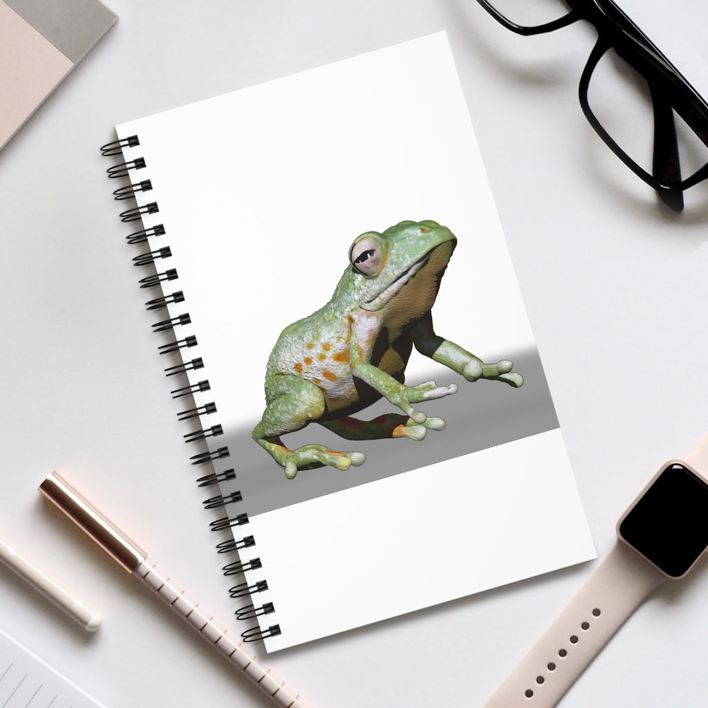 Frog Spiral Journal featuring a colorful front cover with various styles including blank, dot grid, lined, and task layouts, showcasing its versatility.