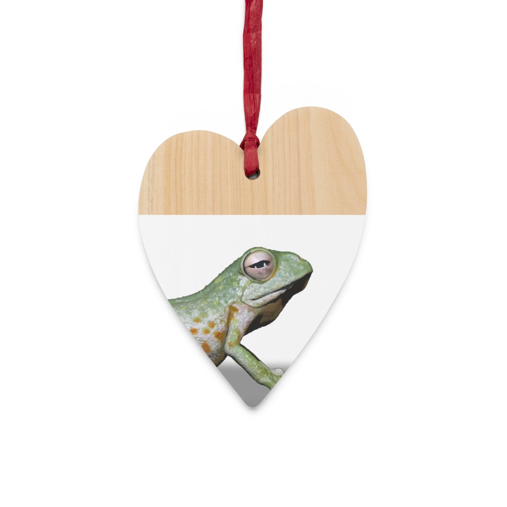 A collection of Frog Wooden Christmas Ornaments in various whimsical shapes, featuring a rustic wood finish and red ribbons for hanging.