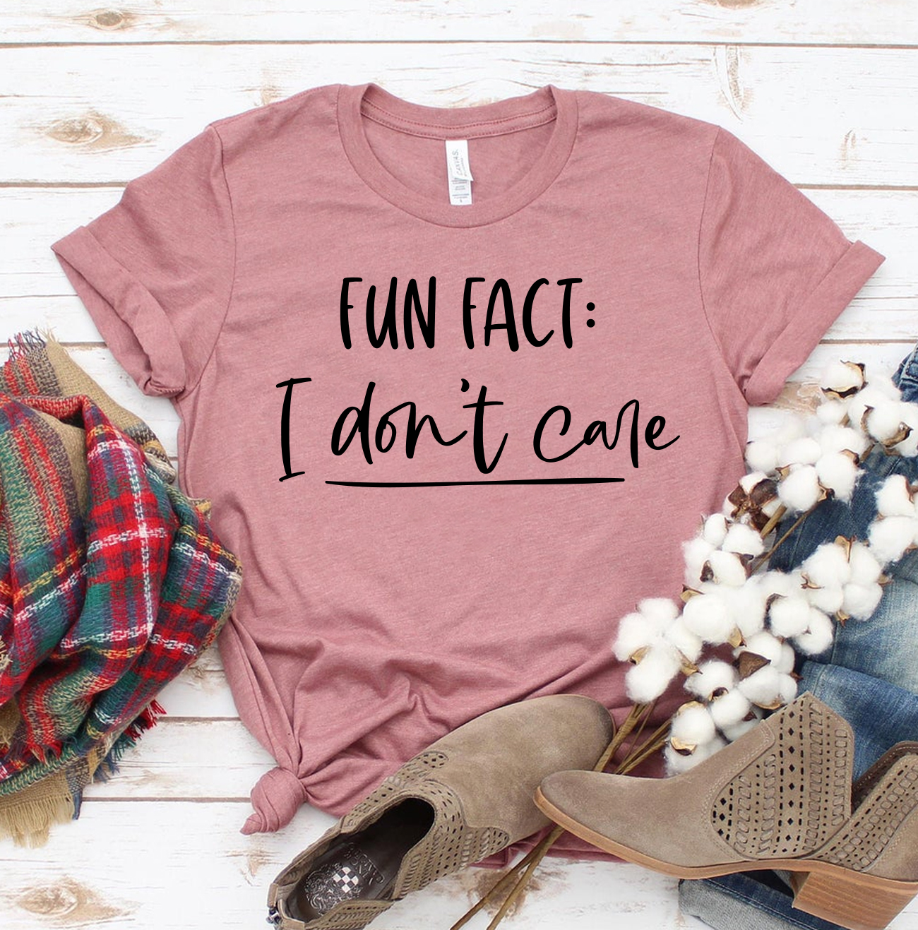 Fun Fact I Don't Care T-shirt made of premium ring spun cotton, featuring a humorous print and available in various sizes.