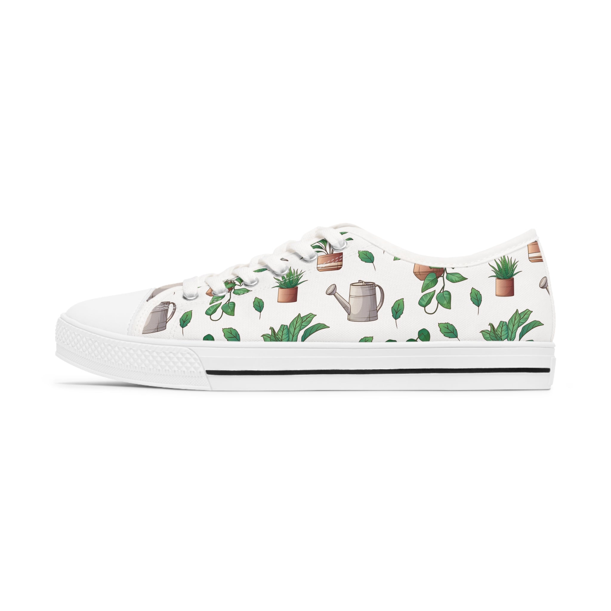 A pair of stylish Gardening Women's Low Top Sneakers in black and white, featuring breathable canvas, memory foam insoles, and silver metal eyelets.