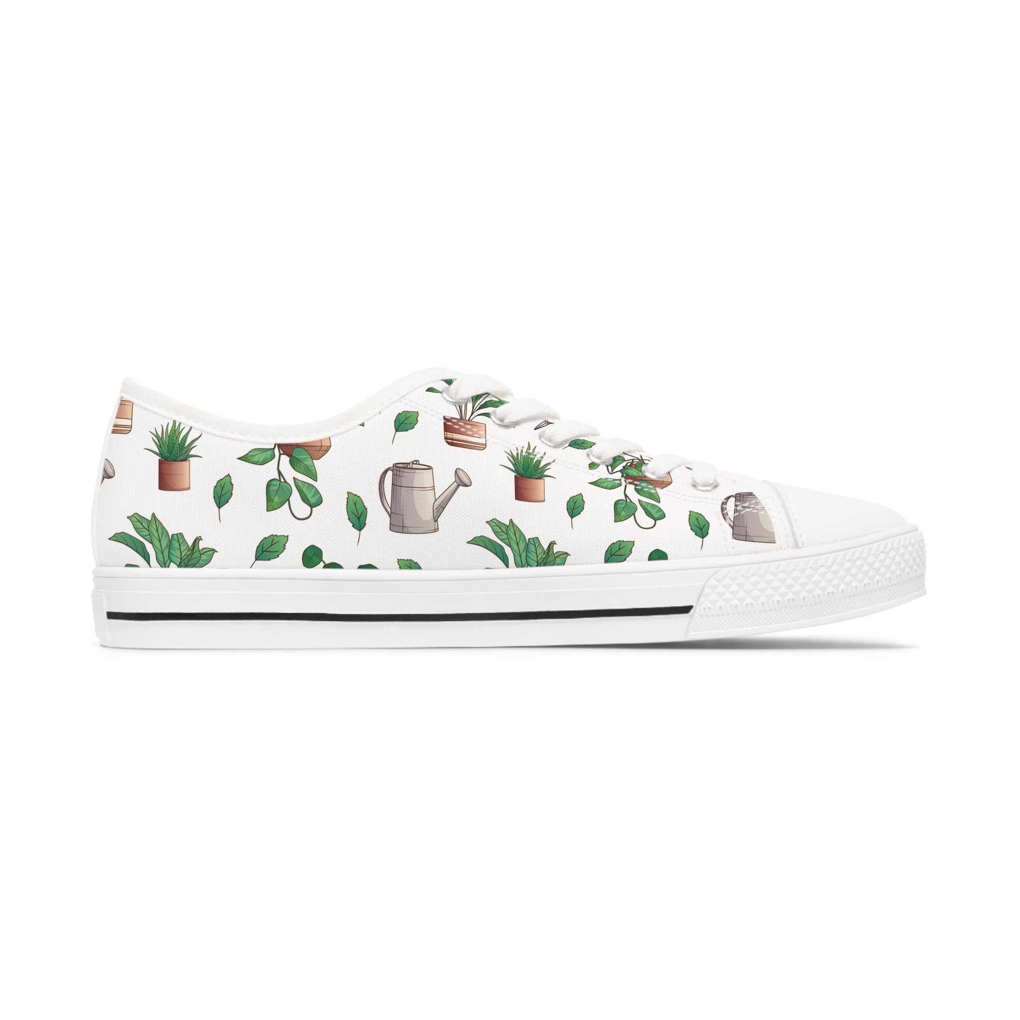 A pair of stylish Gardening Women's Low Top Sneakers in black and white, featuring breathable canvas, memory foam insoles, and silver metal eyelets.