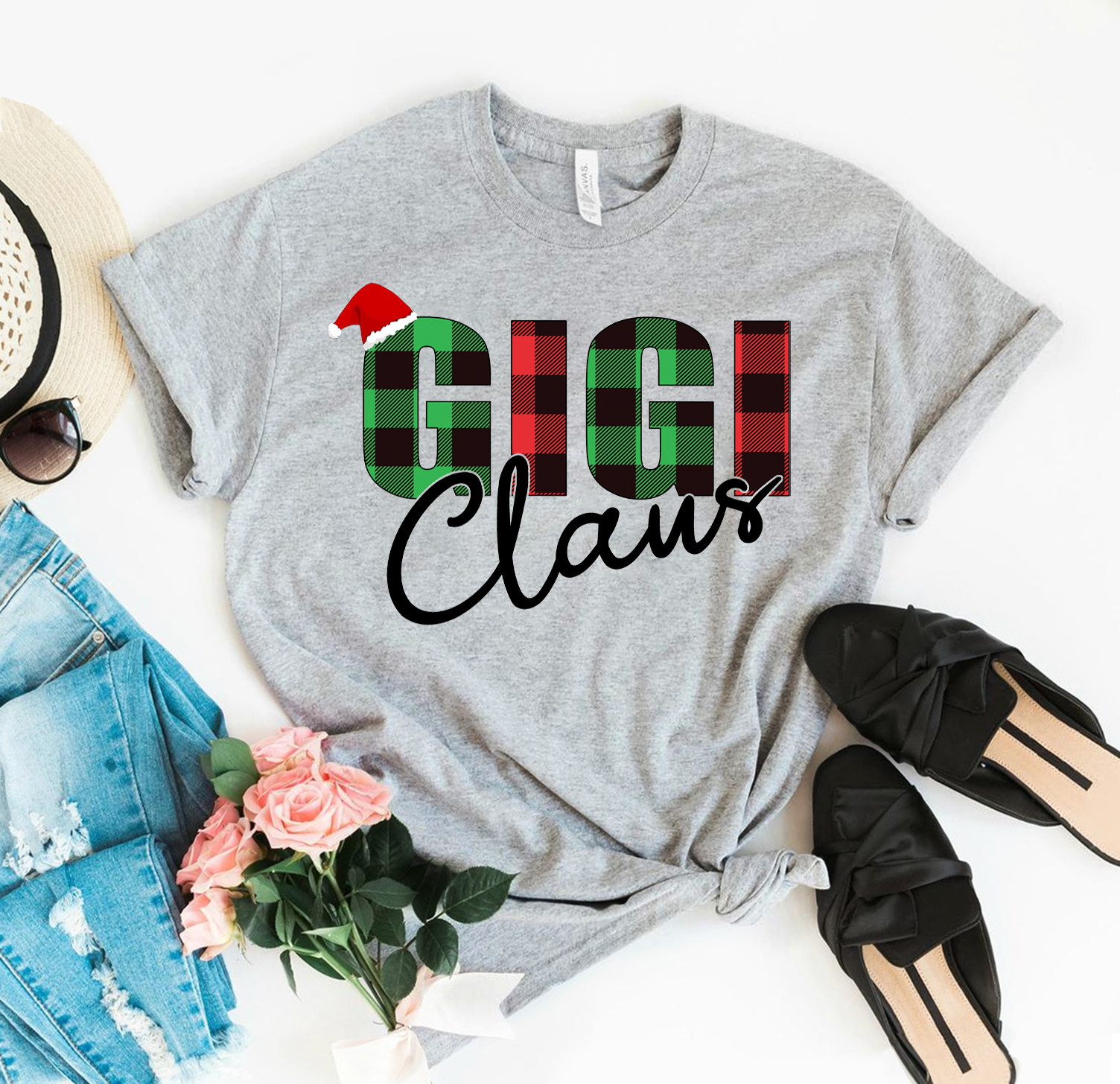 Gigi Claus Christmas T-shirt featuring festive design, made from premium ring spun cotton, available in various sizes.