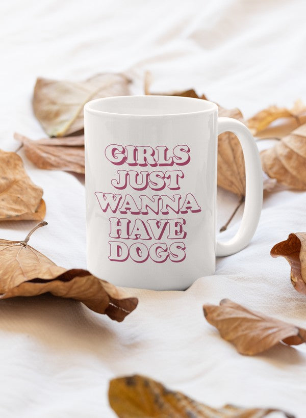 A stylish 11oz ceramic mug with the phrase 'Girls Just Wanna Have Dogs' printed on it, featuring a glossy finish and sturdy handle.