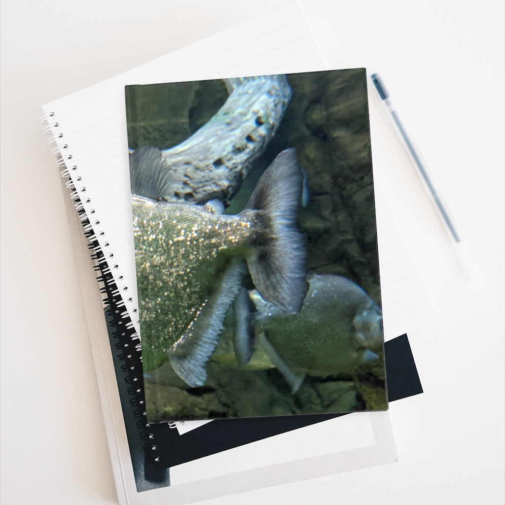 Glitter Green Fish Journal with vibrant fish design on a hardcover, showcasing blank pages for creativity.