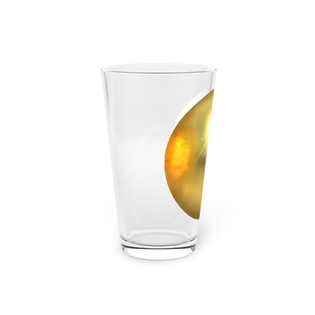 A clear 16oz pint glass with a gold design, perfect for personalized beverages.