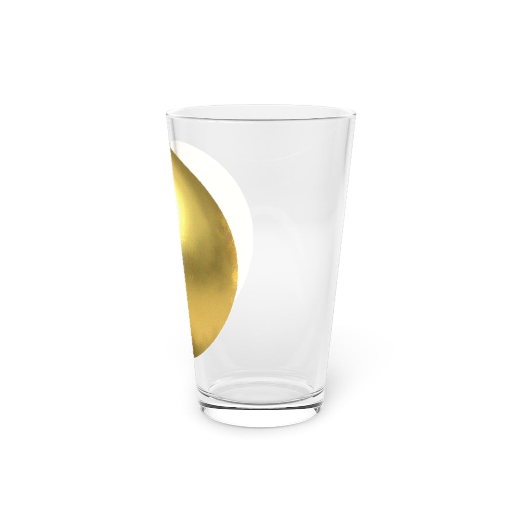 A clear 16oz pint glass with a gold design, perfect for personalized beverages.