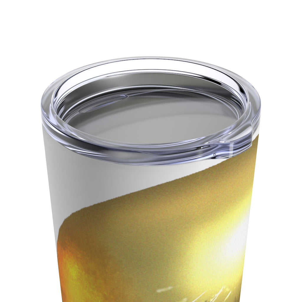 Gold Material Tumbler 20oz made of stainless steel with a see-thru plastic lid, showcasing its sleek design and durable construction.