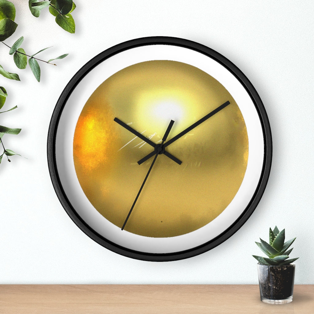 Elegant gold wall clock with wooden frame and plexiglass face, perfect for indoor decor.