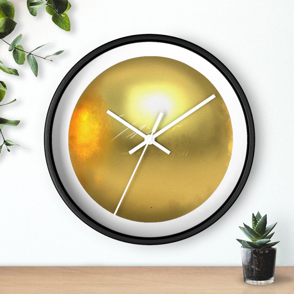 Elegant gold wall clock with wooden frame and plexiglass face, perfect for indoor decor.