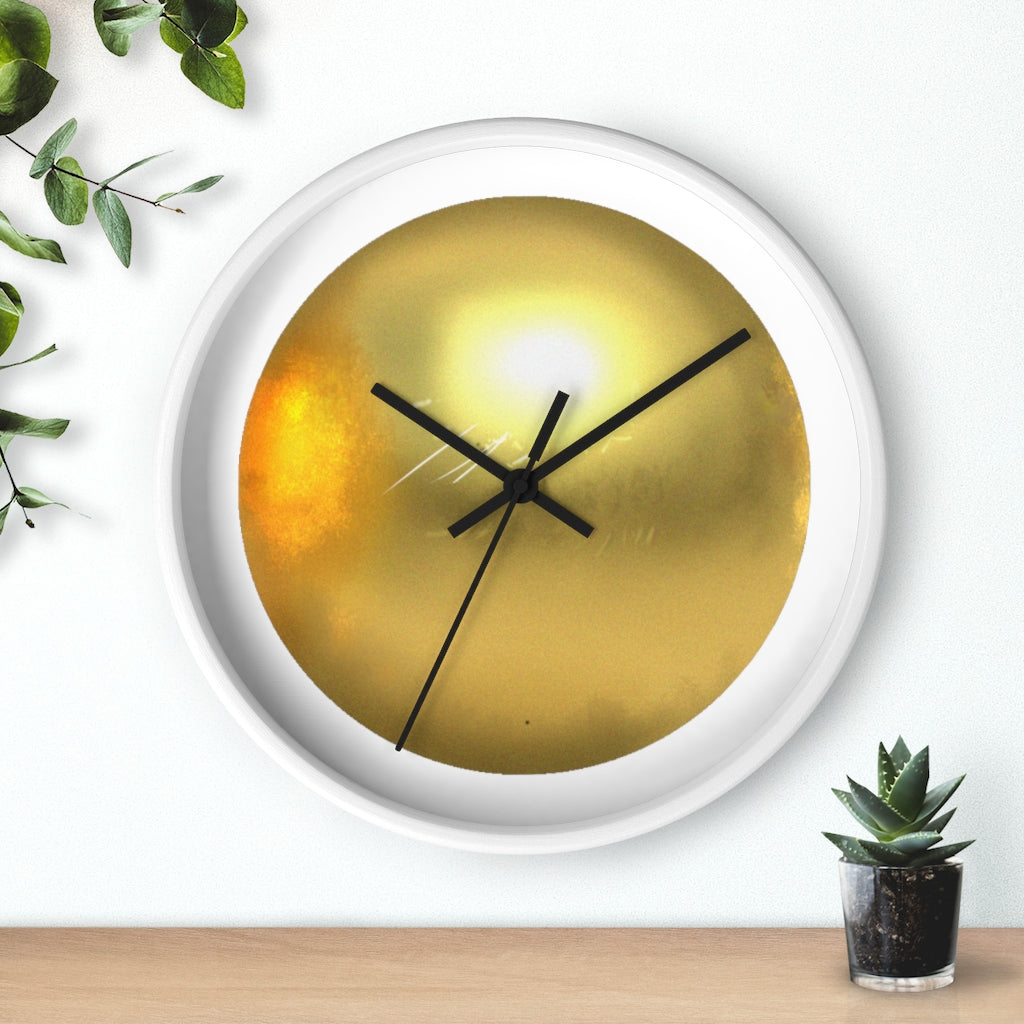 Elegant gold wall clock with wooden frame and plexiglass face, perfect for indoor decor.