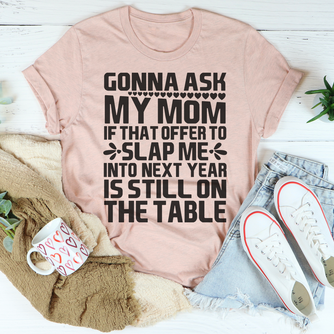 Gonna Ask My Mom T-Shirt displayed on a hanger, showcasing its soft cotton fabric and vibrant print.