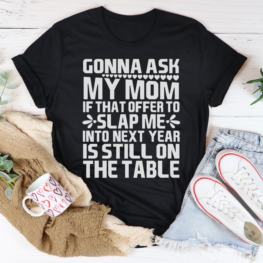 Gonna Ask My Mom T-Shirt displayed on a hanger, showcasing its soft cotton fabric and vibrant print.