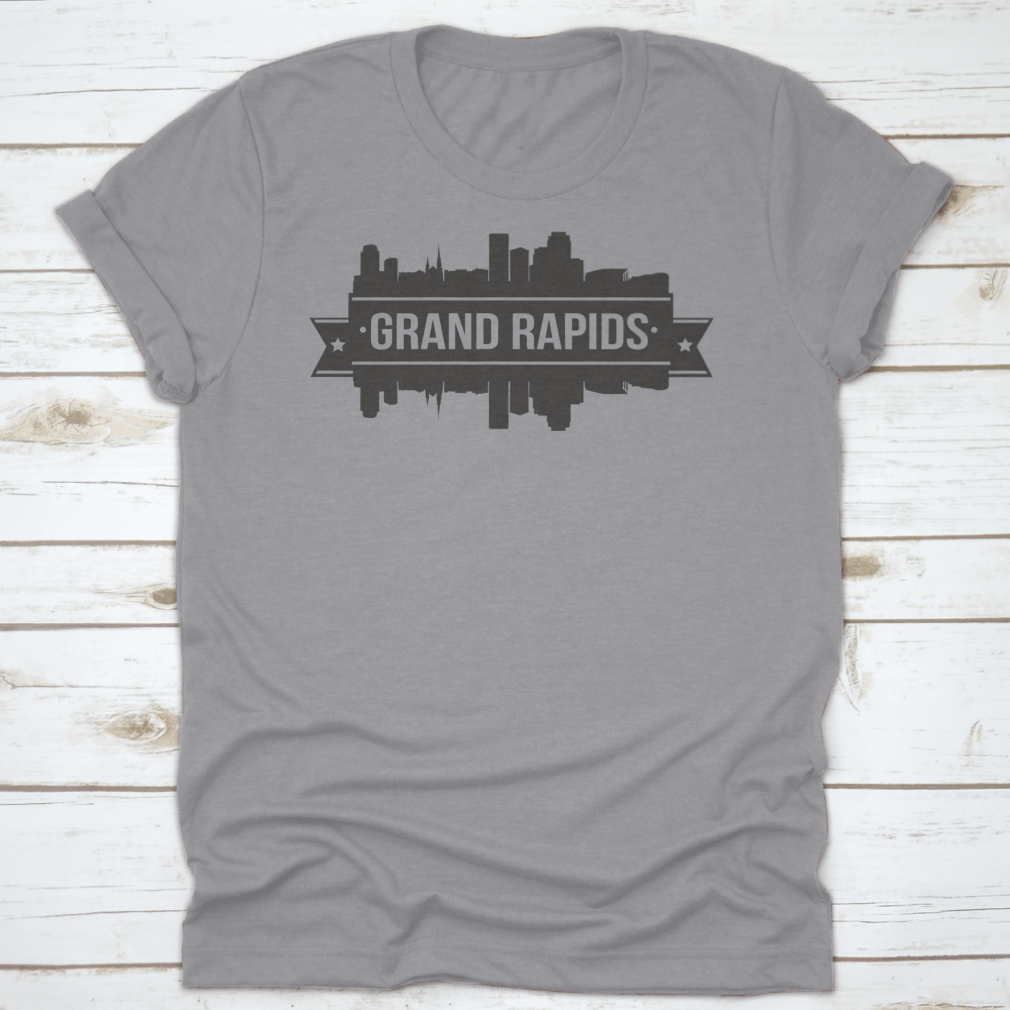 A stylish t-shirt featuring the Grand Rapids skyline silhouette design, showcasing the city's iconic buildings in a modern stamp style.