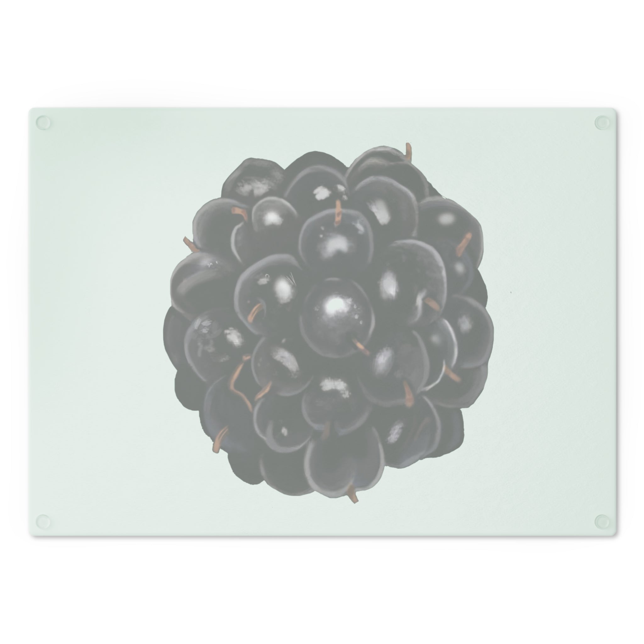 A stylish Grape Cutting Board made of tempered glass with a grape design, featuring four rubber dots for stability.