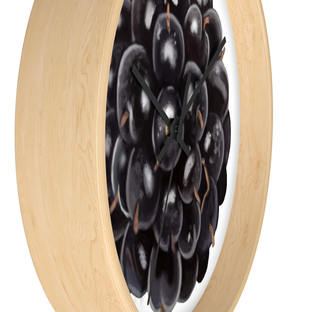 A stylish Grape Wall Clock featuring a wooden frame and a vibrant grape design, perfect for indoor decor.