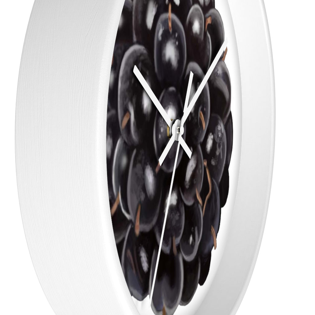 A stylish Grape Wall Clock featuring a wooden frame and a vibrant grape design, perfect for indoor decor.