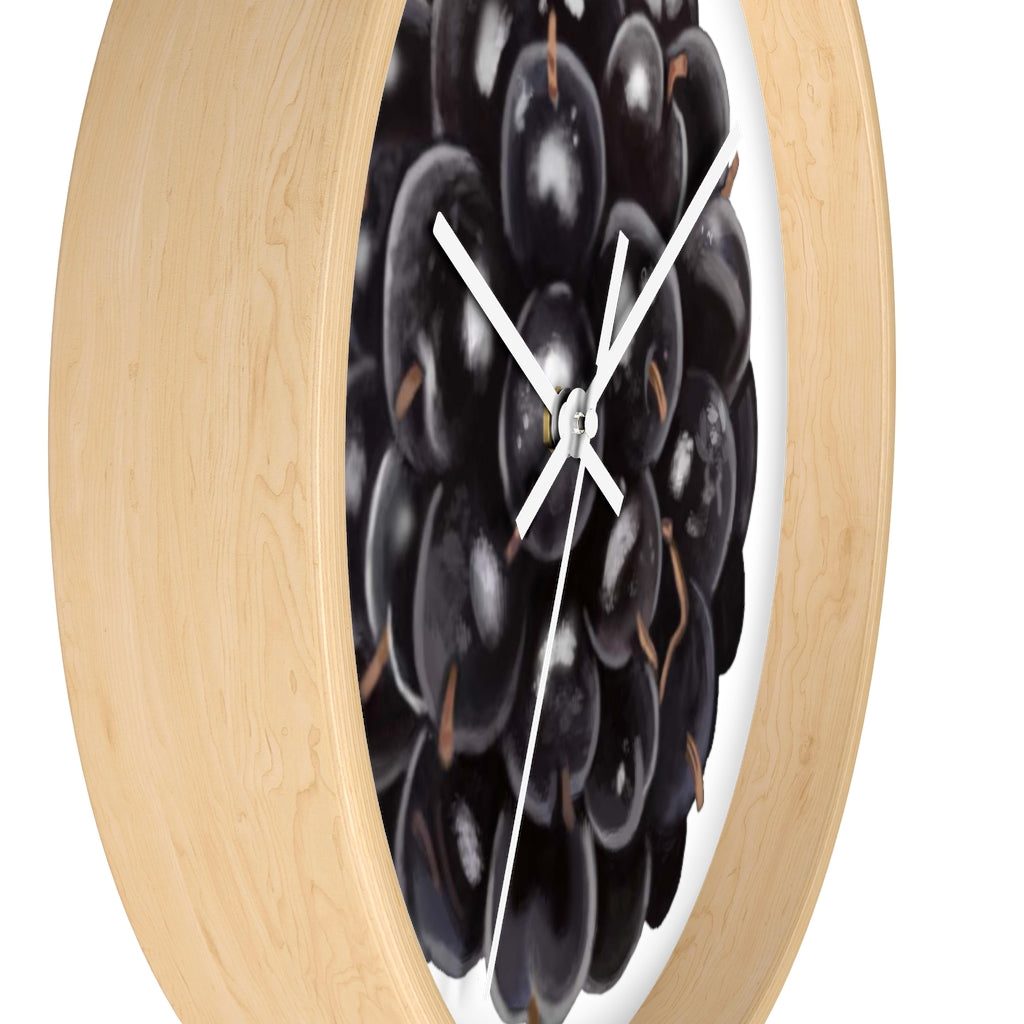 A stylish Grape Wall Clock featuring a wooden frame and a vibrant grape design, perfect for indoor decor.