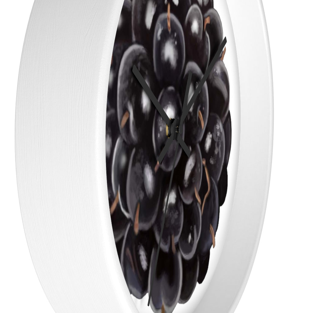 A stylish Grape Wall Clock featuring a wooden frame and a vibrant grape design, perfect for indoor decor.