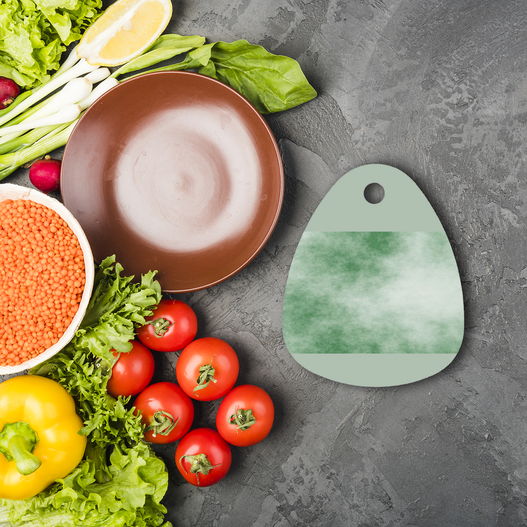 Green Cloud Sublimation Glass Cutting Board with a unique design, featuring a round shape and rubber feet for stability.