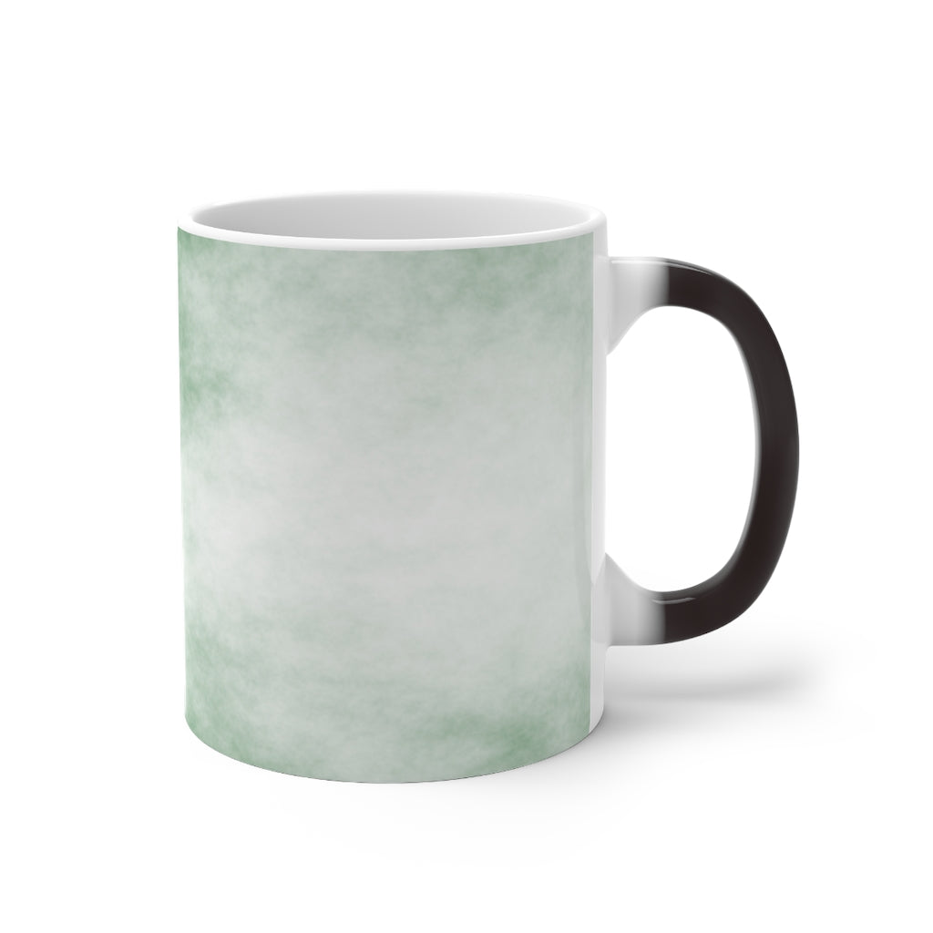 Green Clouds Color Changing Mug showcasing vibrant colors when filled with hot liquid, featuring a C-handle and rounded corners.