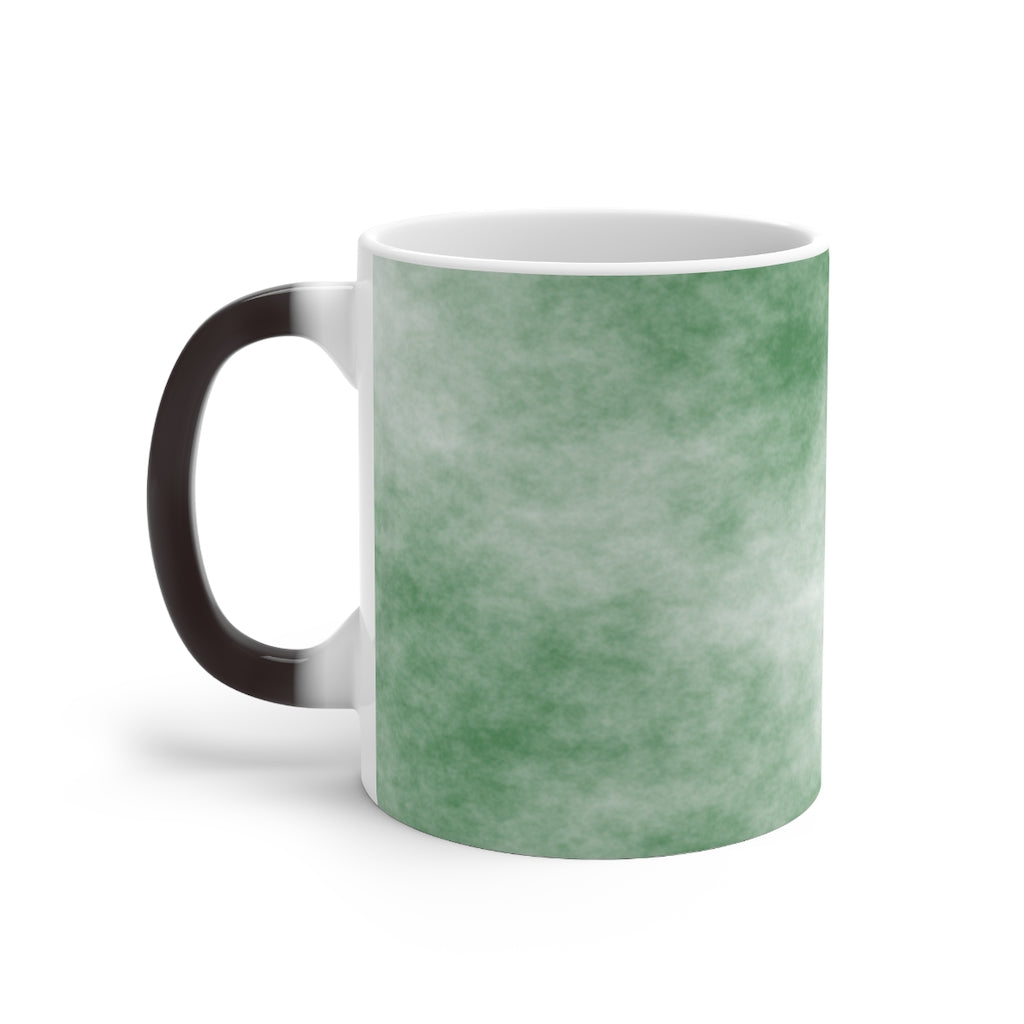 Green Clouds Color Changing Mug showcasing vibrant colors when filled with hot liquid, featuring a C-handle and rounded corners.