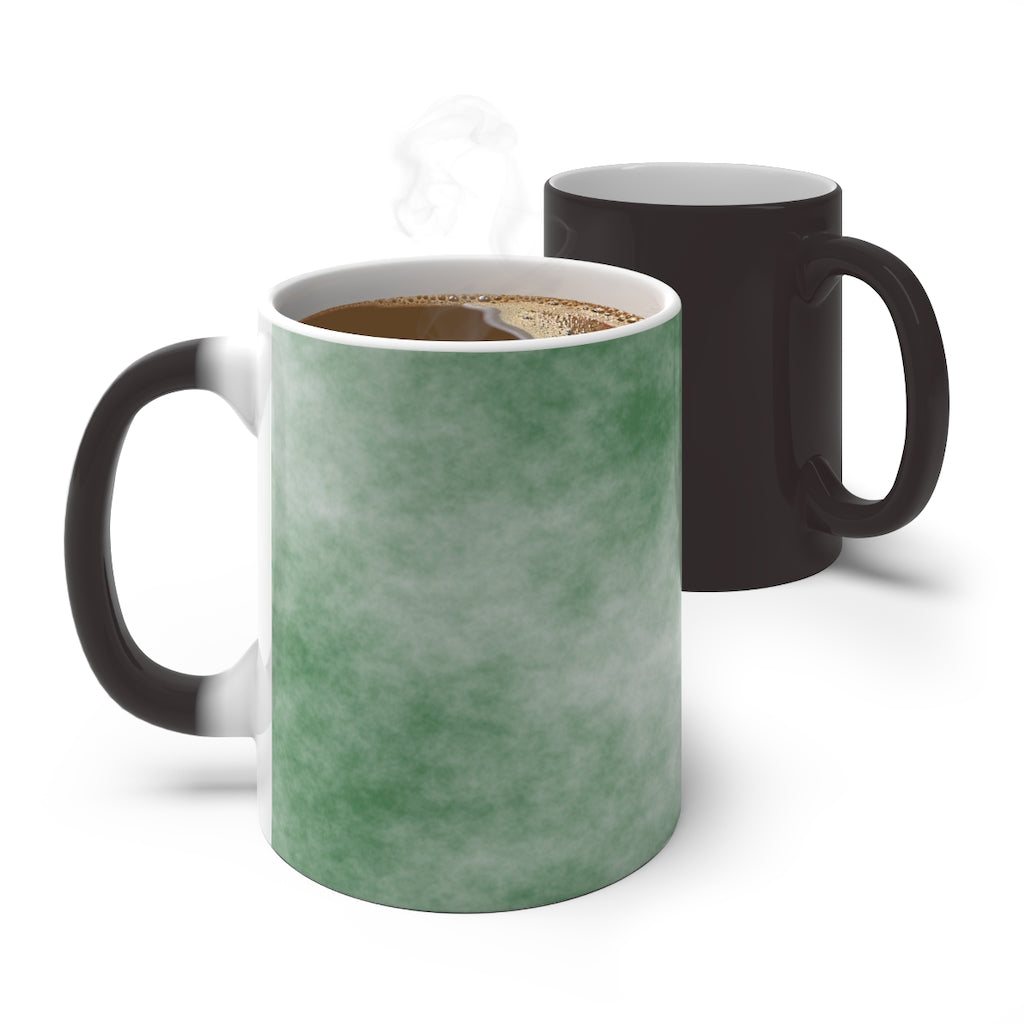 Green Clouds Color Changing Mug showcasing vibrant colors when filled with hot liquid, featuring a C-handle and rounded corners.