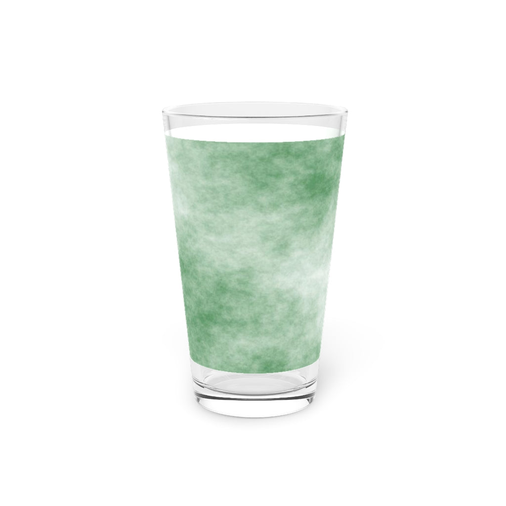 A clear 16oz pint glass featuring a green cloud design, perfect for personalized beverages.