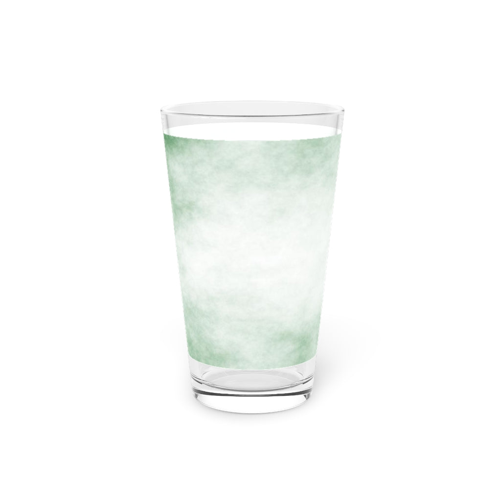 A clear 16oz pint glass featuring a green cloud design, perfect for personalized beverages.