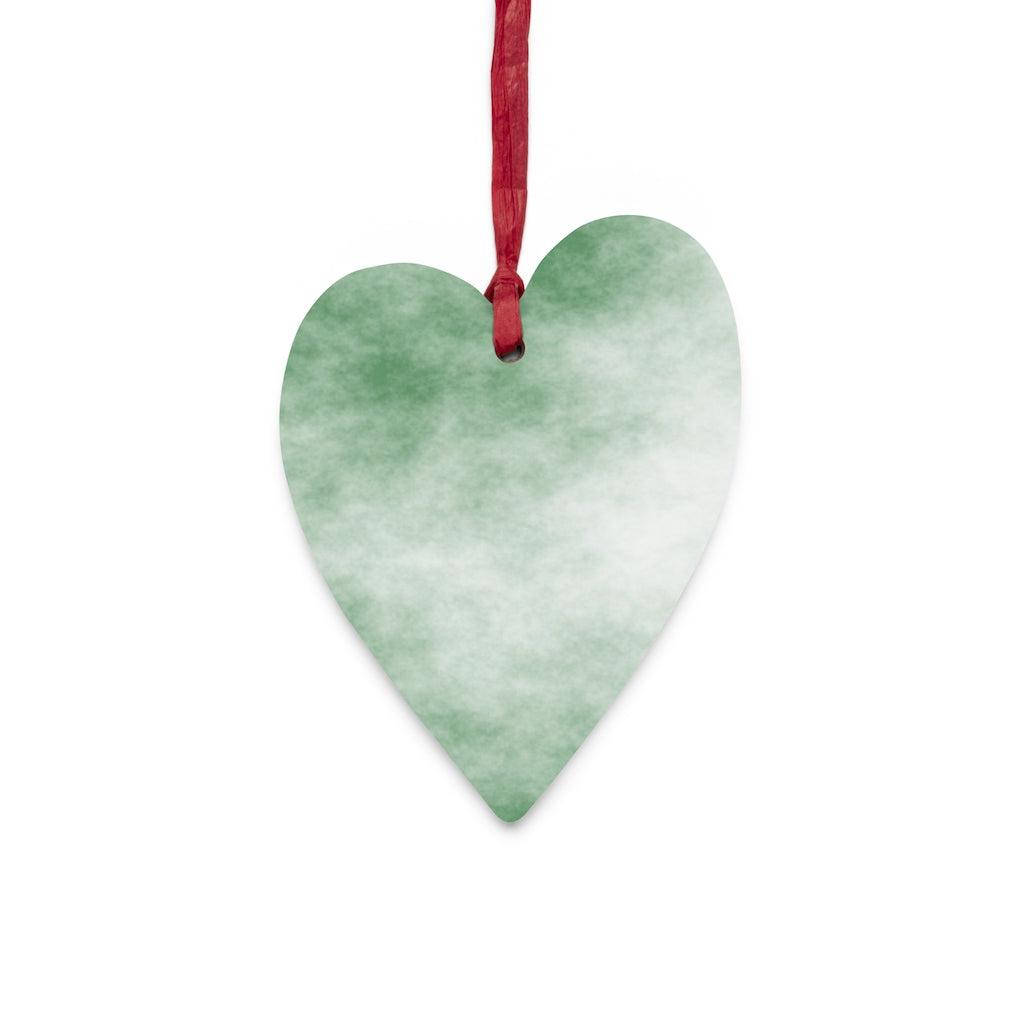 A collection of Green Clouds Wooden Christmas Ornaments in various whimsical shapes, featuring a rustic wood finish and red ribbons for hanging.