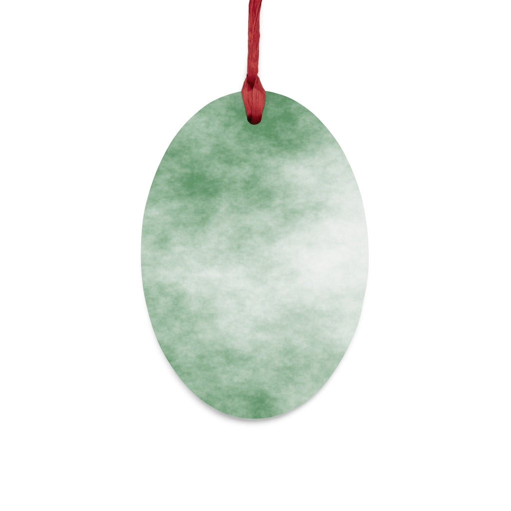 A collection of Green Clouds Wooden Christmas Ornaments in various whimsical shapes, featuring a rustic wood finish and red ribbons for hanging.