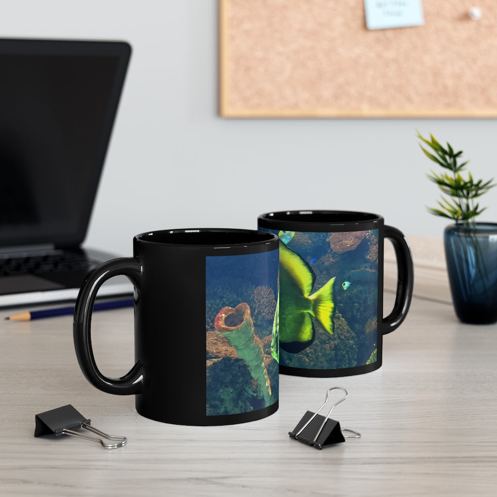 Green Fish 11oz black ceramic mug with a C-handle, perfect for coffee, tea, or hot chocolate.