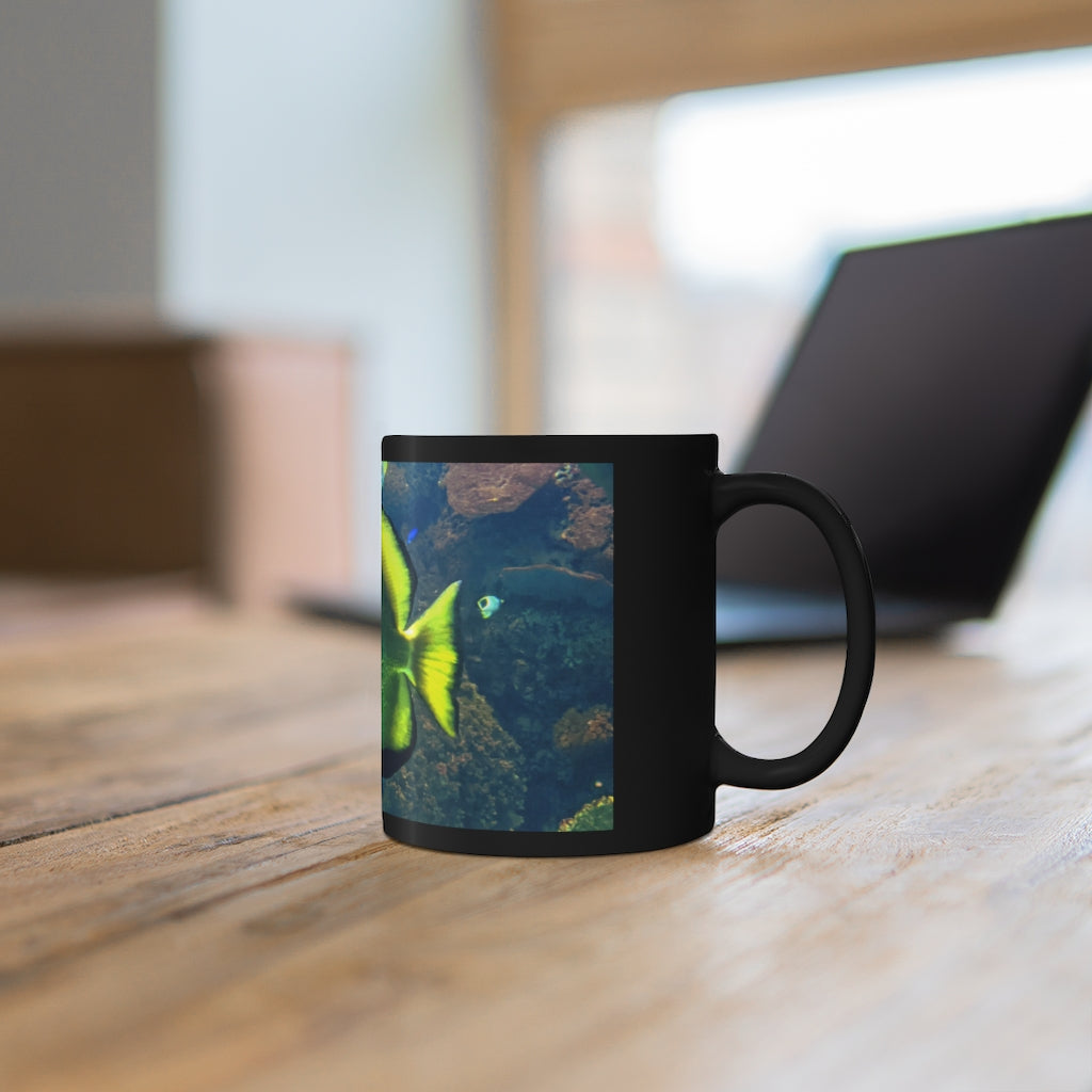 Green Fish 11oz black ceramic mug with a C-handle, perfect for coffee, tea, or hot chocolate.