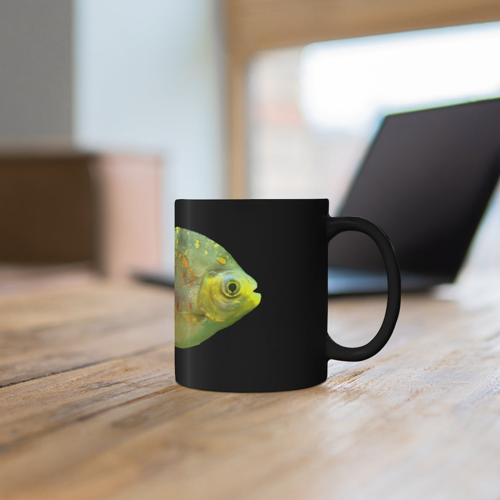 Green Fish 11oz black ceramic mug with a C-handle, perfect for coffee, tea, or hot chocolate.