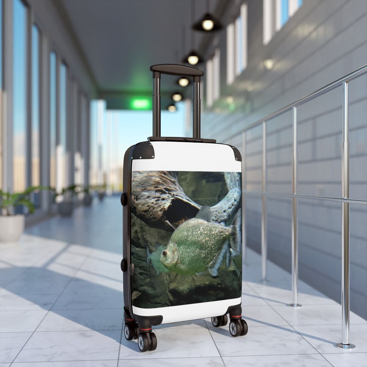 Green Fish Cabin Suitcase with personalized design, featuring a polycarbonate shell and adjustable handle.