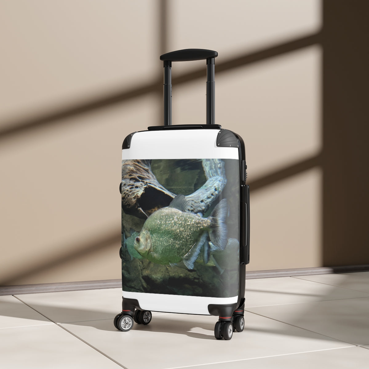 Green Fish Cabin Suitcase with personalized design, featuring a polycarbonate shell and adjustable handle.