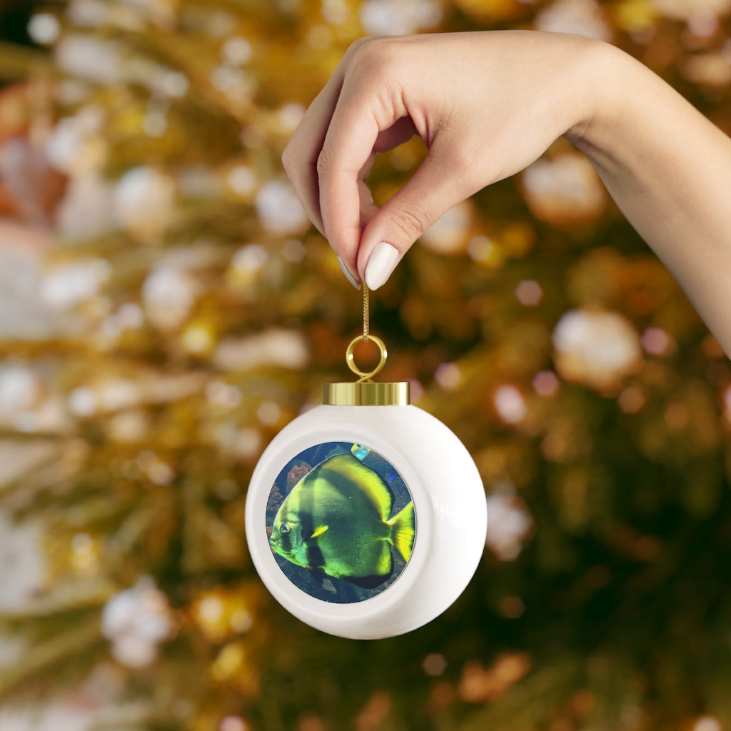 A beautiful Green Fish Christmas Ball Ornament with a glossy finish and gold ribbon, featuring a vintage design and customizable metal insert.