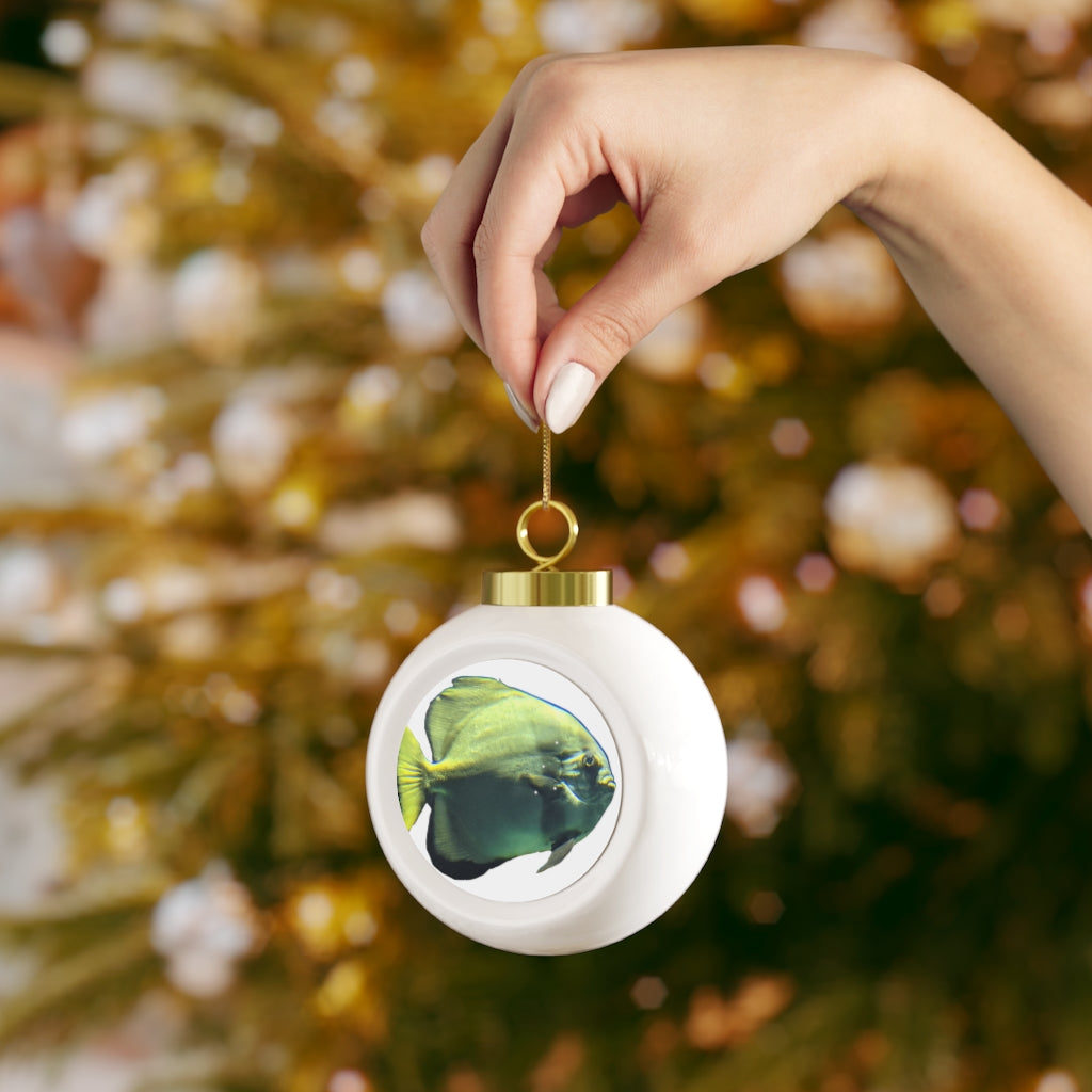 A glossy green fish Christmas ball ornament with a gold ribbon, showcasing a vintage design and customizable metal insert.