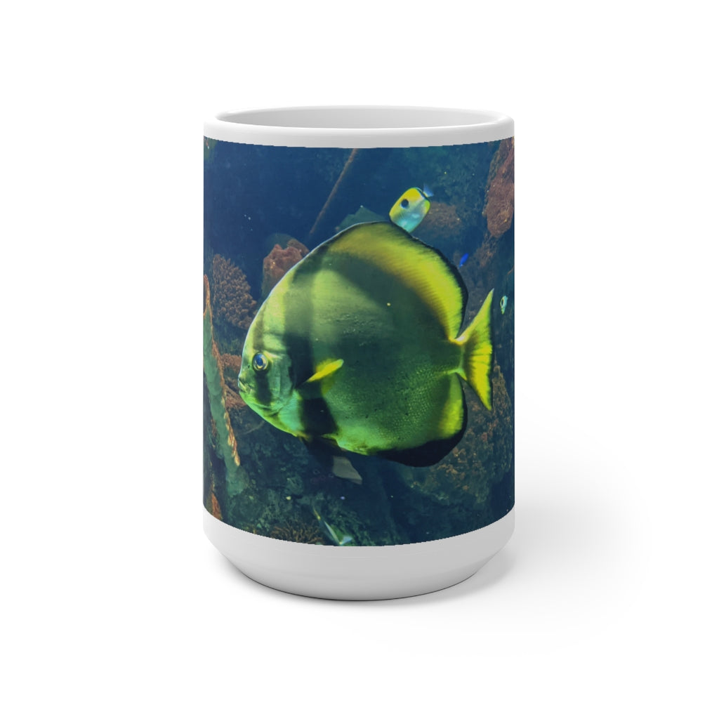 Green Fish Color Changing Mug showcasing its vibrant color transformation when filled with hot liquid.