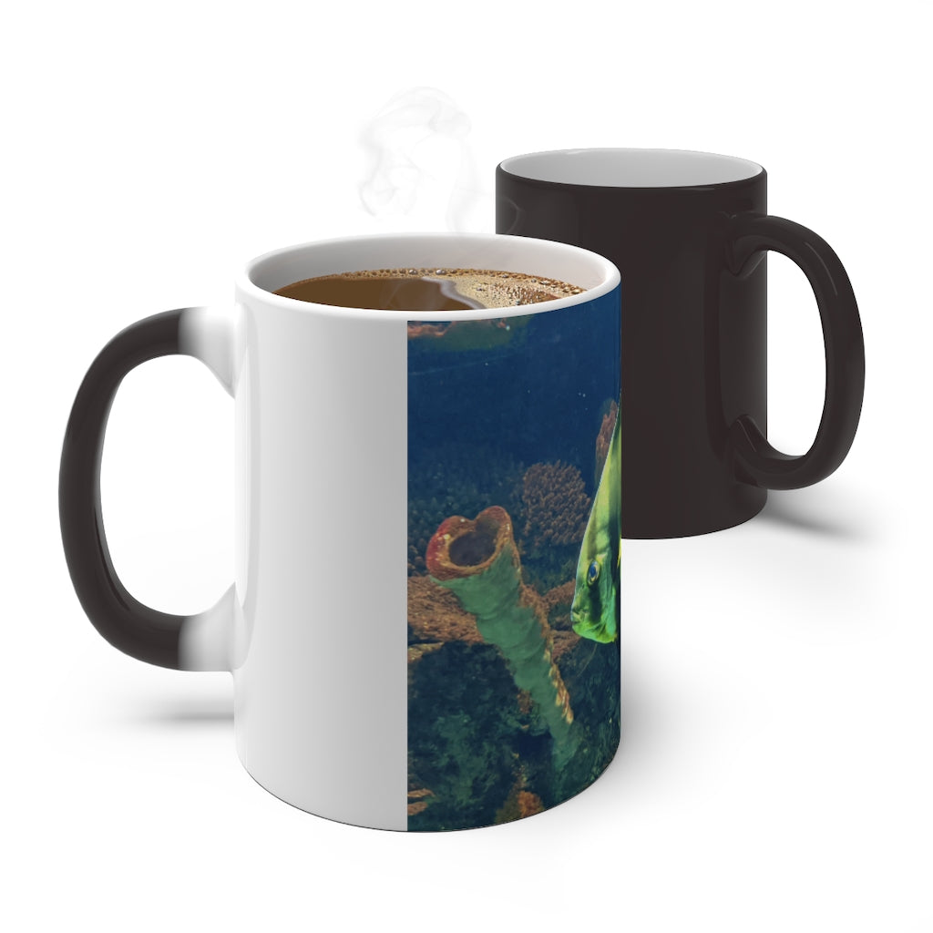 Green Fish Color Changing Mug showcasing its vibrant color transformation when filled with hot liquid.