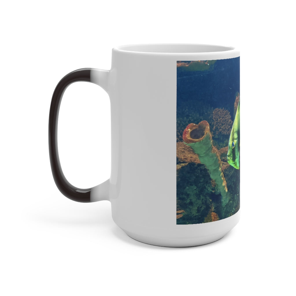 Green Fish Color Changing Mug showcasing its vibrant color transformation when filled with hot liquid.