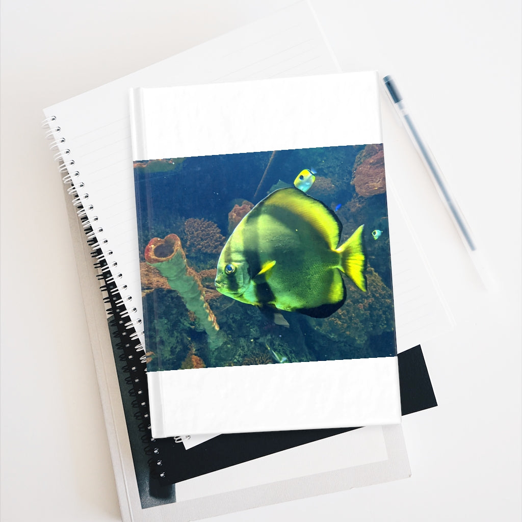 Green Fish Journal with blank pages and vibrant wraparound print, perfect for creative writing and sketching.