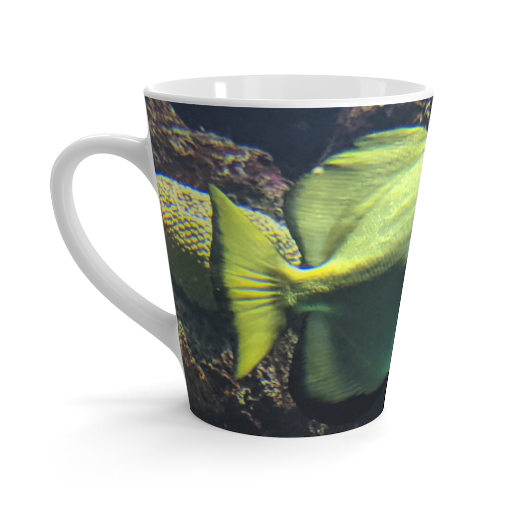 A stylish green fish latte mug made of durable ceramic, featuring a unique design and comfortable C-handle.