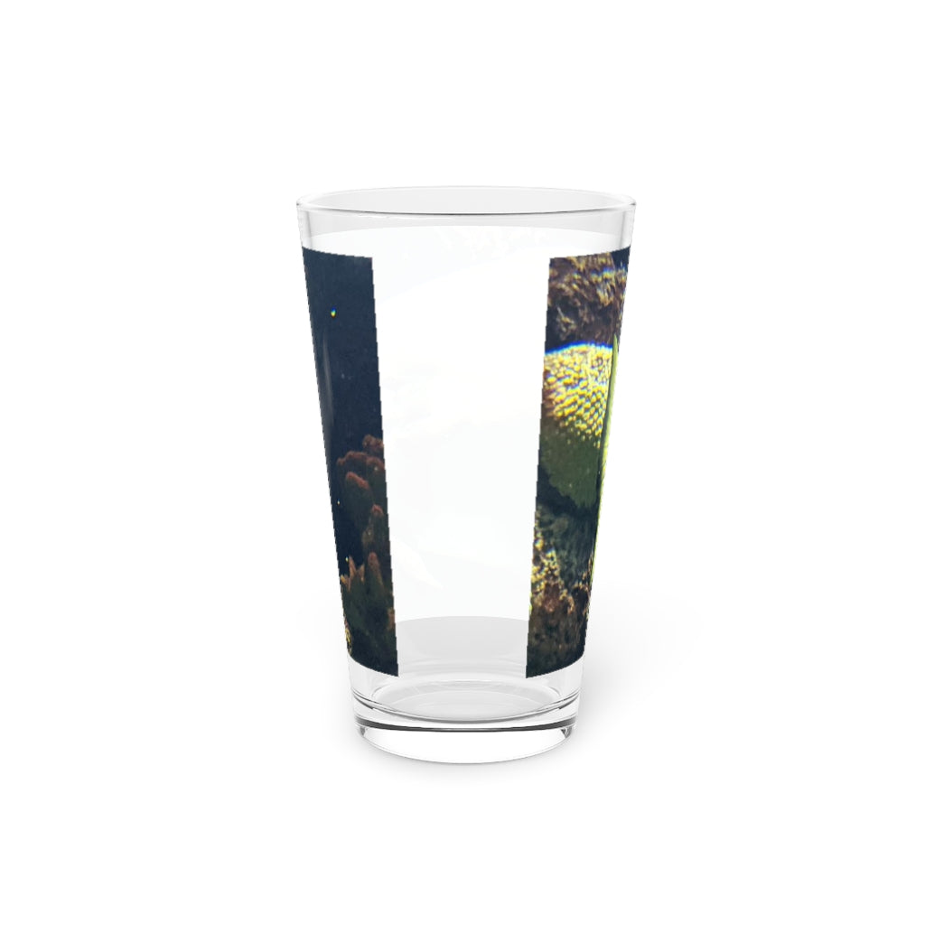 A clear 16oz pint glass featuring a green fish design, perfect for personalized beverages.