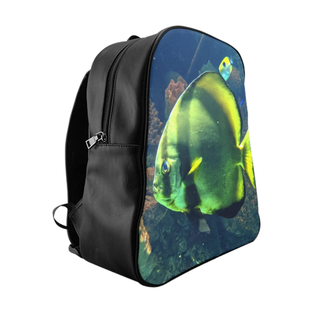 Green Fish School Backpack featuring a unique fish print design, padded back, and multiple inside pockets, made from durable PU leather.