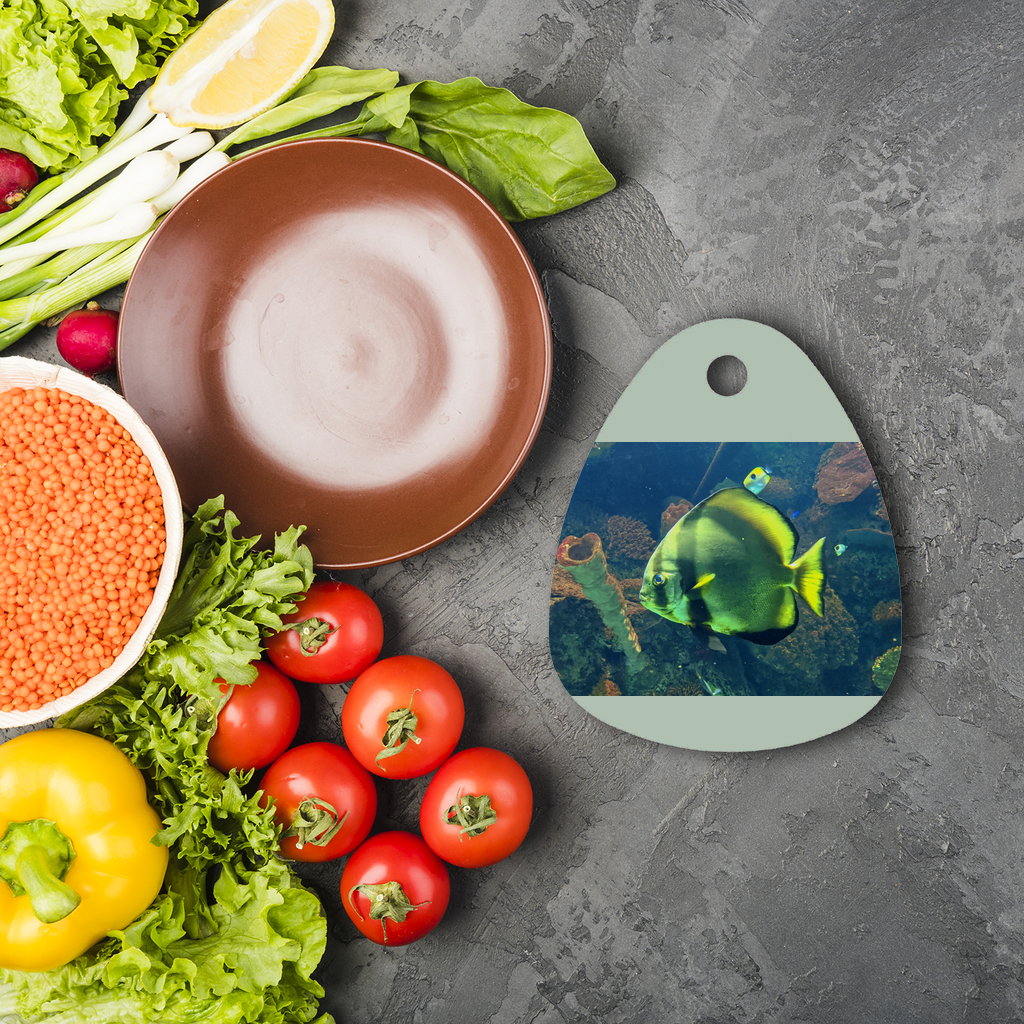 Green Fish Sublimation Glass Cutting Board with a water droplet shape, featuring a vibrant design space for custom artwork.