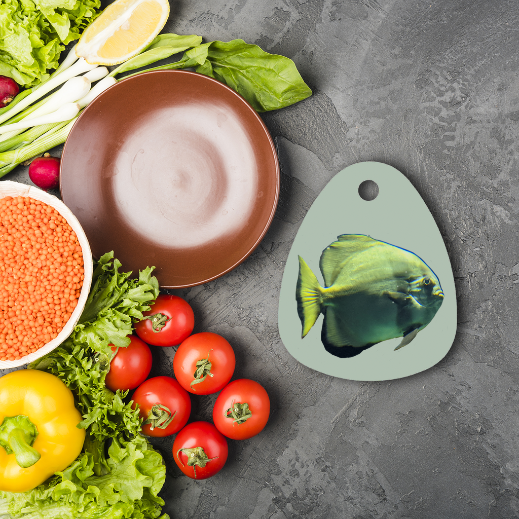 Green Fish Sublimation Glass Cutting Board with vibrant design, featuring a round shape and rubber feet for stability.